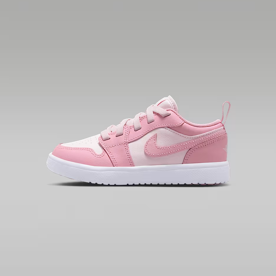 Pink and white sneaker with a brand logo on a gray background