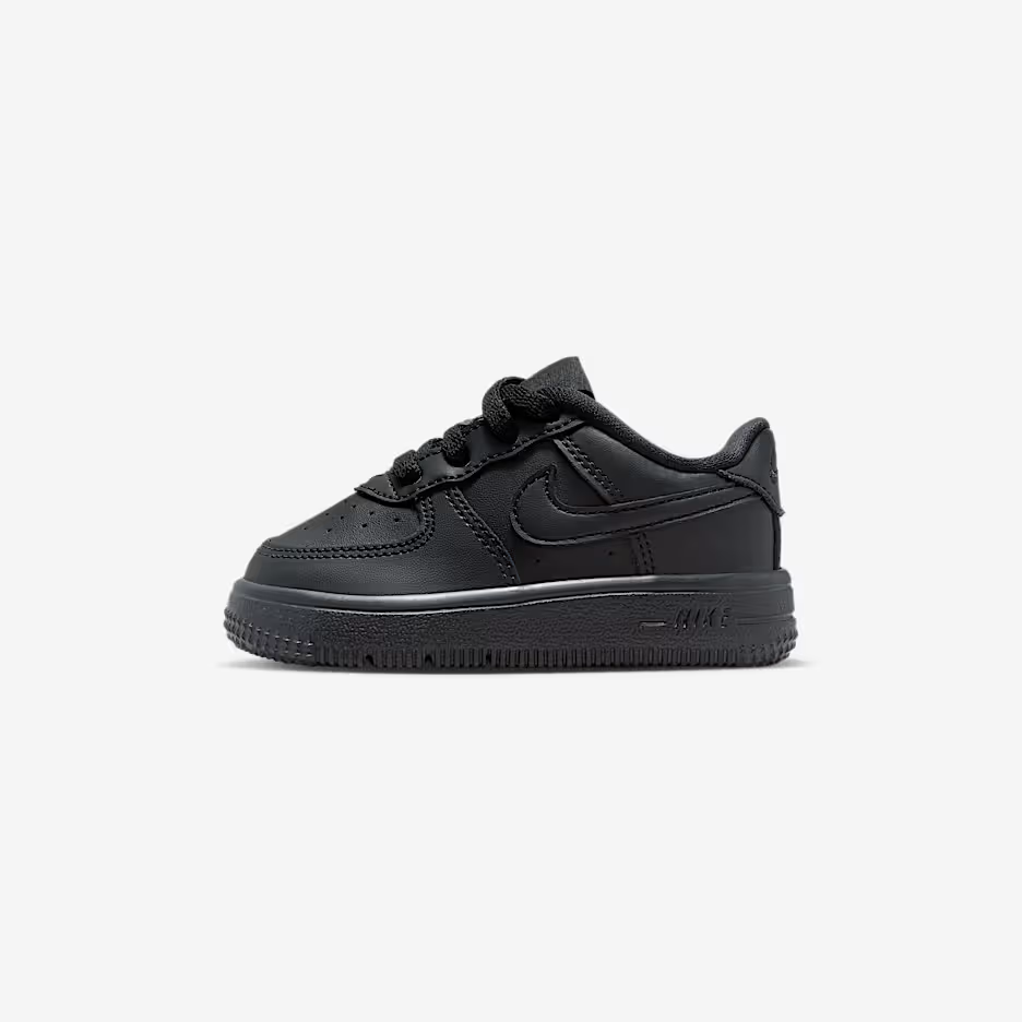 Black sneaker on a light gray background