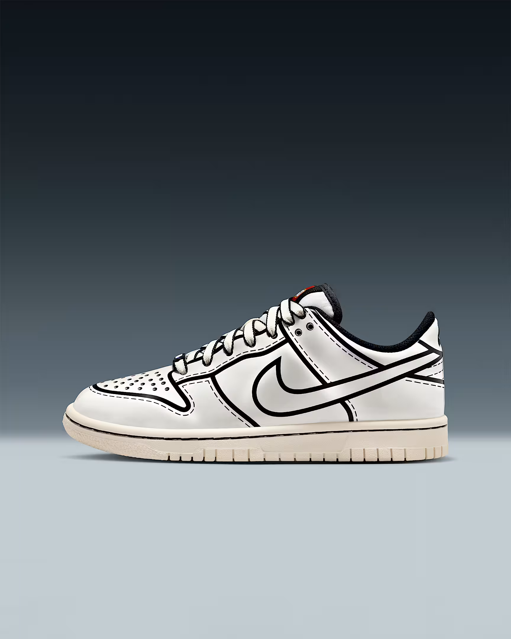 White sneaker with black line art design on a gray background