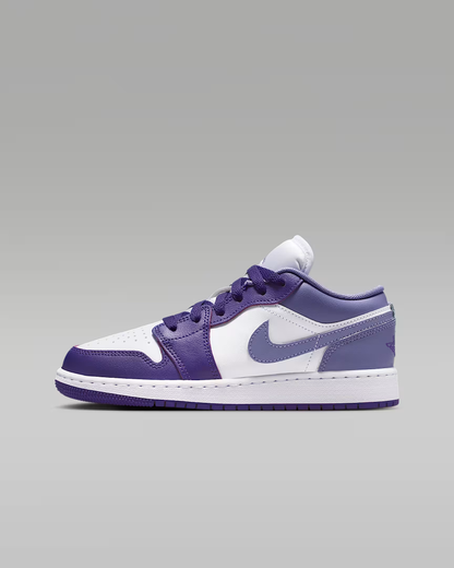 Purple and white sneaker on a gray background