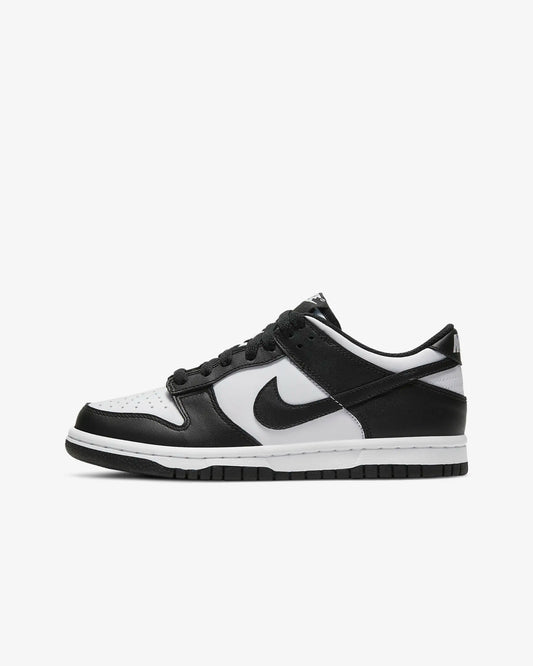 A customized Big Kids' Dunk Low primarily in black and white colors.