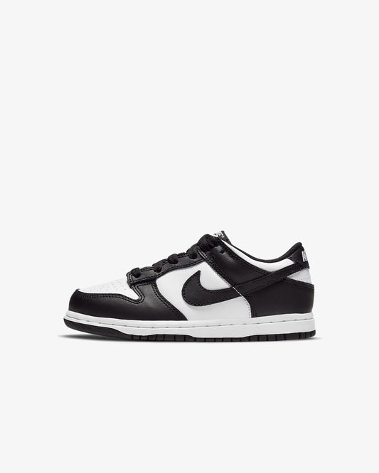 A pair of kids' Dunk Low sneakers in white and black 
