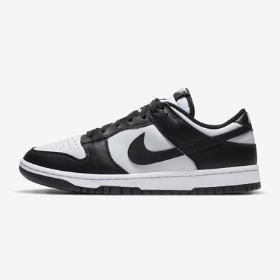 A Dunk Low sneaker with a white and black color scheme