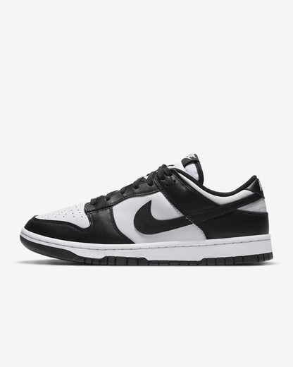 A Dunk Low sneaker with a white and black color scheme