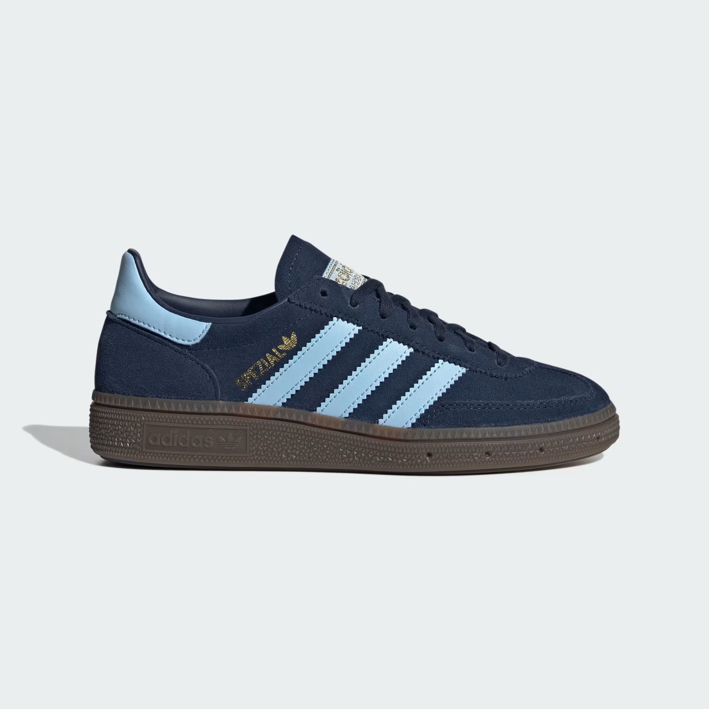 Navy sneaker with light blue stripes on a white background