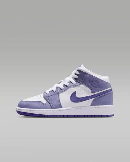 Purple and white sneaker on a gray background