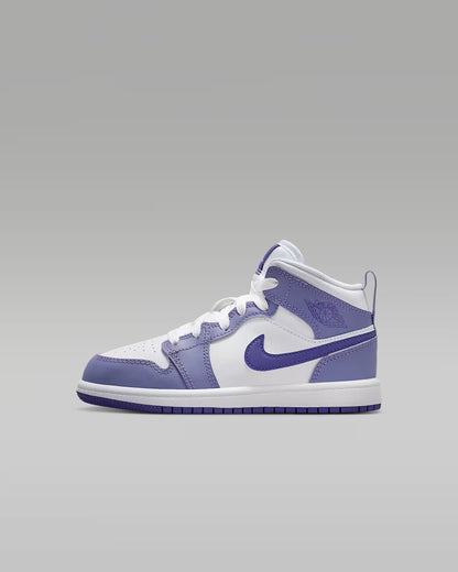 White and purple sneaker on a gray background