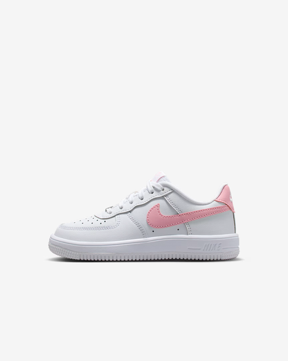 White sneaker with pink accents on a white background
