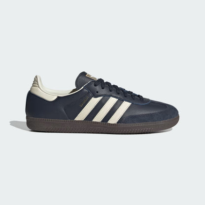 Navy blue sneaker with white stripes on a light gray background