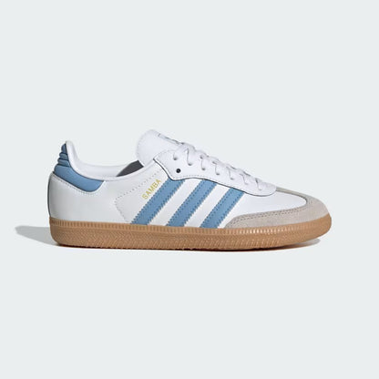 White sneaker with blue stripes on a light gray background