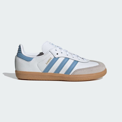 White sneaker with blue stripes on a light gray background