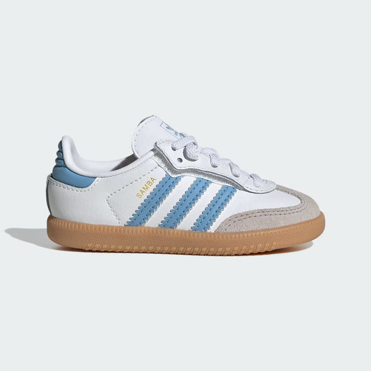 White and blue sneaker with brown sole on a light gray background